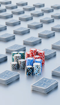 Playing cards and poker chips arranged together