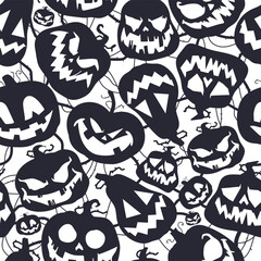 Halloween pumpkins with spooky faces vector cartoon seamless pattern background.