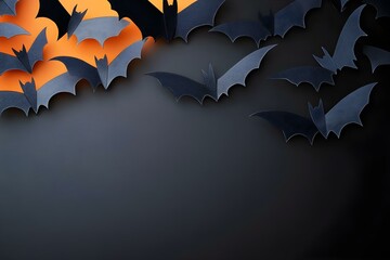 Halloween background featuring paper cut bats in flight Top view with copy space