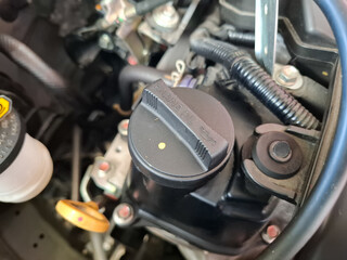 Obraz premium cap the hole for filling engine oil in a car