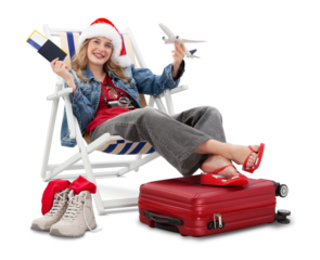 Christmas Holiday travel and vacation concept, tourist woman in travel attire wears santa hat, on deck chair with trolley suitcases, showing passport, ticket and airplane. Flight and travel booking