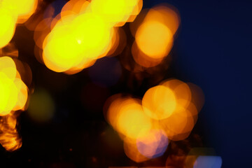 blurred golden  lights bokeh on dark background - Image