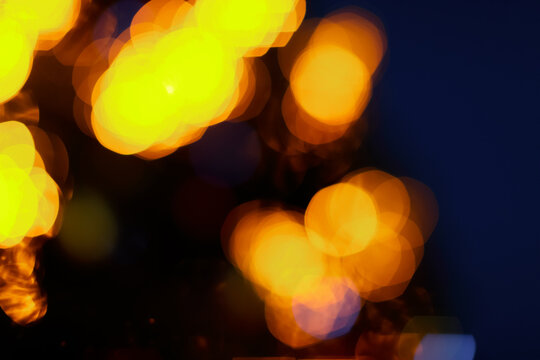 blurred golden  lights bokeh on dark background - Image
