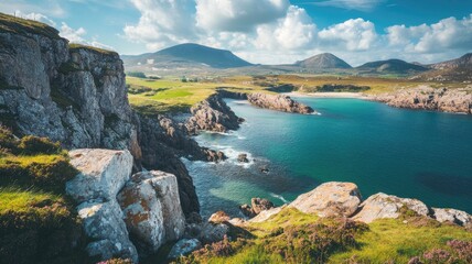 Scenic coastal landscape with rocky cliffs and vibrant blue sea under clear sky