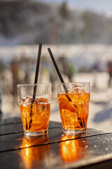 Children and adults, happy family in winter clothing at ski vacation, skiing, winter