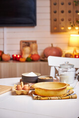 A view of the table where the ingredients for the pumpkin pie are placed