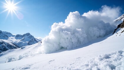 Avalanche releasing snow in a bright winter landscape under a sunny sky with mountains