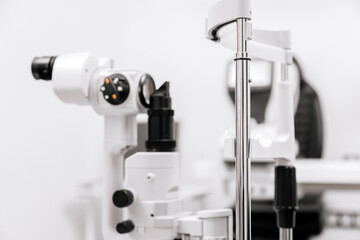 Close-up of a laser for vision diagnostics and correction against a white background in an ophthalmologist's office. Modern equipment highlighting the importance of quality eye care.