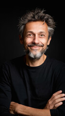 Obraz premium handsome caucasian smiling man with beard isolated on black background looking at camera