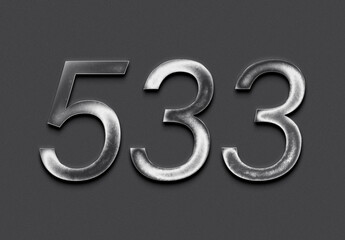 Chrome metal 3D number design of 533 on grey background.