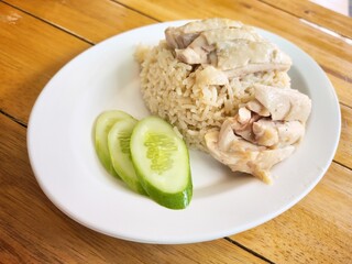 Steamed rice topped with chicken Singaporean food