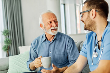 nurse doctor senior care caregiver help assistence retirement home nursing elderly man health support  coffee tea drinking cup