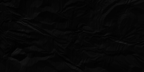 Black crumpled paper texture . Black wrinkled paper texture. Black paper texture . Black crumpled and top view textures can be used for background of text or any contents .