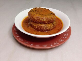 Indian food aloo tikki served in a bowl