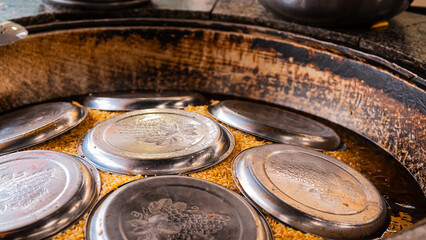 traditional oriental Arabic Uzbek pilaf with meat in a cauldron. Central Asian Pilaf Center in Uzbekistan in Tashkent