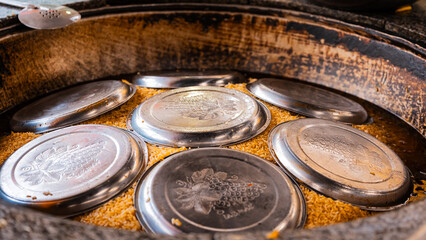 traditional oriental Arabic Uzbek pilaf with meat in a cauldron. Central Asian Pilaf Center in Uzbekistan in Tashkent