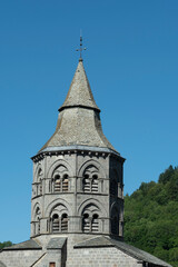 Fototapeta premium Basilica Notre Dame d'Orcival. Natural regional park of volcans d'auvergne. Puy de Dome. Auvergne Rhone Alpes. France