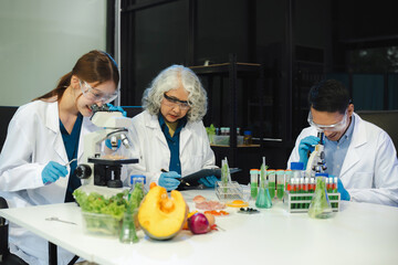 Team Microbiologists Analyzing Molecular Samples in Advanced Food Science Laboratory, Dietitian food and medicine.