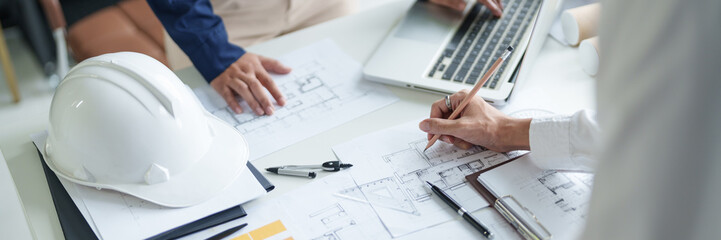 Architecture drawing on architectural project business architecture building construction Colleagues designer Planning Design on blueprint and compasses