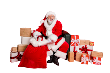 Portrait of nice cheerful cheery generous fat bearded man St Nicholas packing preparing fairy miracle orders winter december holly jolly isolated over bright vivid shine red background
