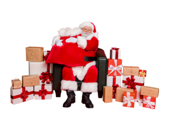 Full length photo of dream dreamy cheerful positive glad cute Saint Nicholas getting ready for midnight 2020 to share desirable present with children sitting on chair isolated over bright background