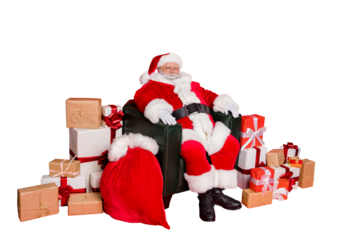 Photo of wise glad cute Father Christmas enjoy wait time and kid favorite winter days. Sitting near stack pile many lot wrapped boxes and large bag cap with dreamy presents isolated vivid background