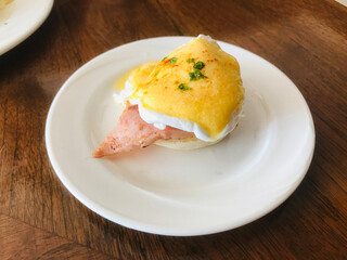 Dish of yummy Eggs Benedict.