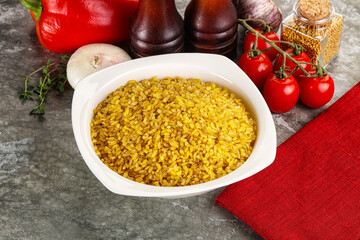 Dry wheat bulgur cereal heap