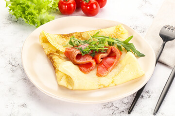 Russian pancake with salmon fish