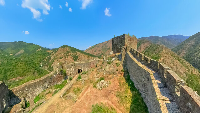 Drone view of Maglic fortress of 13th-century, dominating the Ibar in Serbia, offering a panoramic vista of a Great Morava Valley. A national Monument of Culture of Exceptional Importance in Serbia.