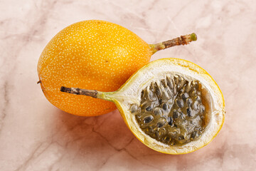 Yellow granadilla with cut half
