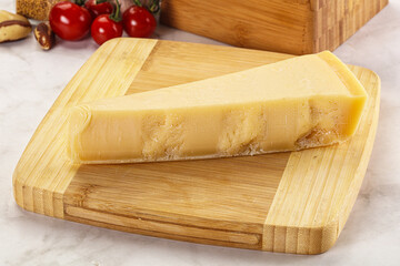 Hard parmesan cheese piece triangle