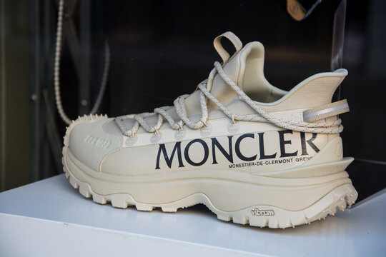 Mulhouse - France - 29 September 2024 - closeup of beige moncler sneakers in a fashion store showroom