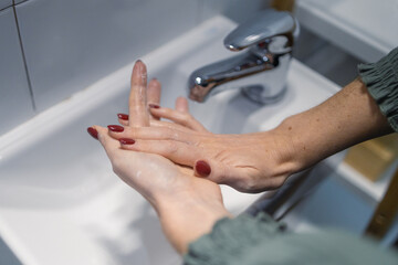 woman washing hands