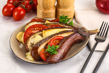 Baked tomato with mozzarella and tomato