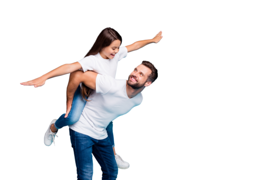 Profile side photo of cheerful people holding hands playing piggyback wearing white t-shirt denim jeans isolated over blue background