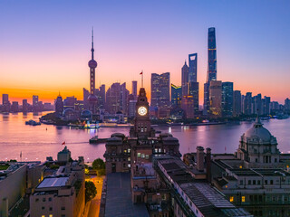 Obraz premium Aerial view of modern city skyline and buildings at sunrise in Shanghai