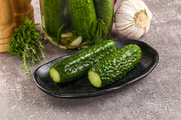 Homemade lighty salted cucumbers with herbs
