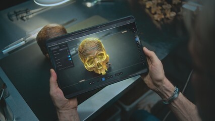 Modern archaeological lab: Archaeologist studies ancient human anatomy using tablet computer. Screen shows user interface, process of scanning fossil skull through camera in 3D modeling software. VFX