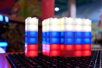 Russian flag in the form of cubes on top of each other, a luminous constructor on a special panel