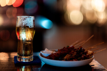 Barbecue Food in nature Cooking on the grill Picnic Holiday in nature Close-up of grilled medium-rare barbecue steak Food concept