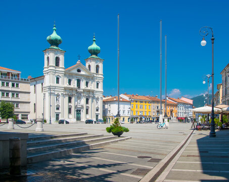 Scenic view of Victory Square (Piazza della Vittoria) and St Ignatius church (Chiesa di Sant'Ignazio) in Gorizia, Italy at summer sunny day