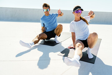 Young Individuals Engage in an Outdoor Fitness Routine on a Sunny Day, Showcasing Synchronized...