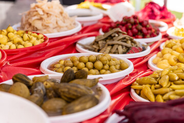 homemade vegetable pickles,Stand with mixed pickles at an open-air market