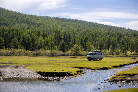 Russian off-road van with tourists moving somewhere in Mongolia