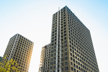 Fototapeta premium New modern building under construction. Directly below