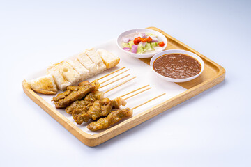 Delicious Skewered Meat with Salad and Dipping Sauce