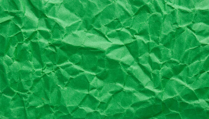 Obraz premium Crumpled green paper background. Creative abstract texture for your design.