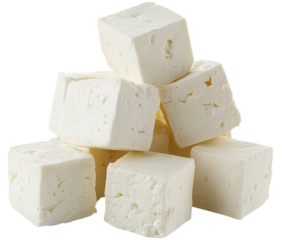 Deliciously fresh cheese cubes piled artfully on a pristine white background