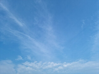
Blue sky with feathery clouds